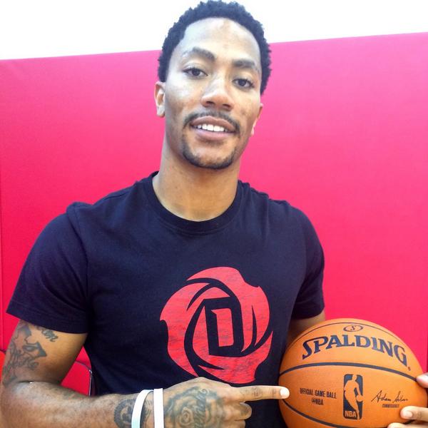 Derrick Rose shows off the addition to the @Spalding #NBAGameBall for the 2014-15 season! 
